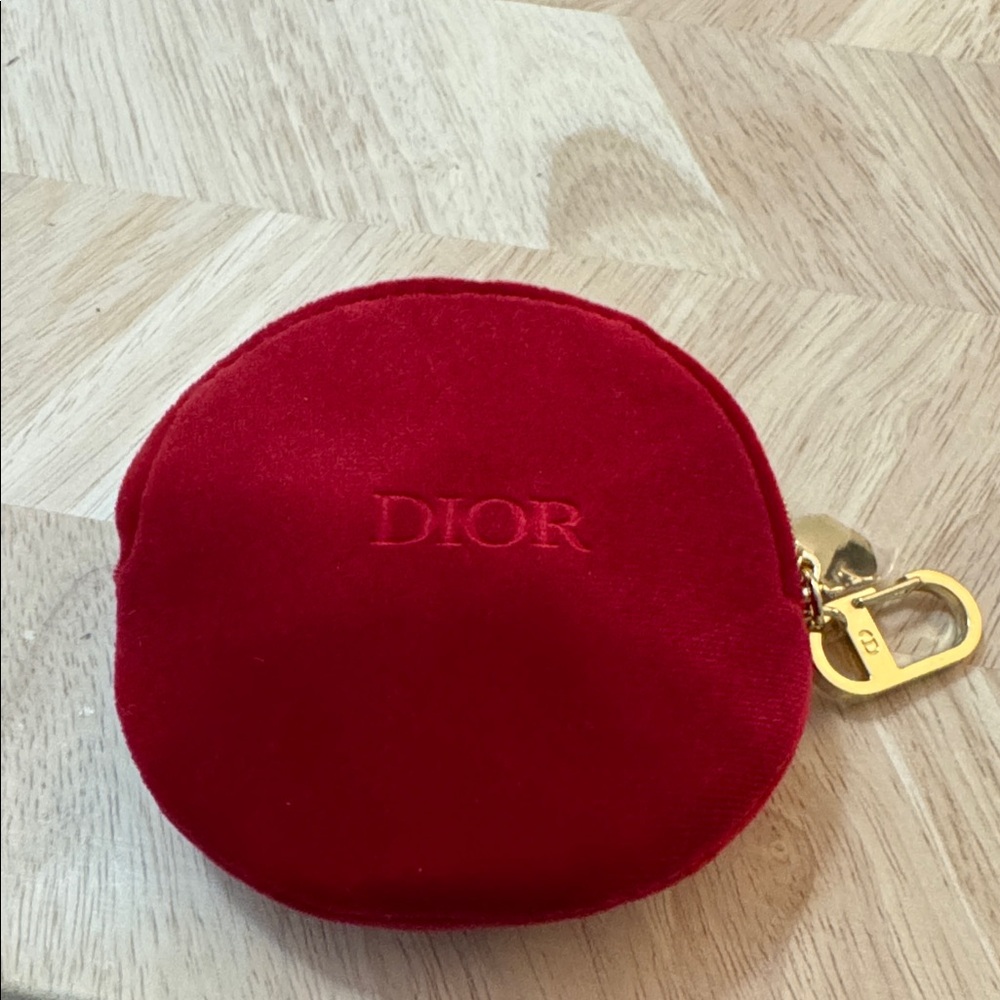 Dior Hypnotic Poison a small red velvet round pouch and a mini fragrance bottle - Picture 5 of 5